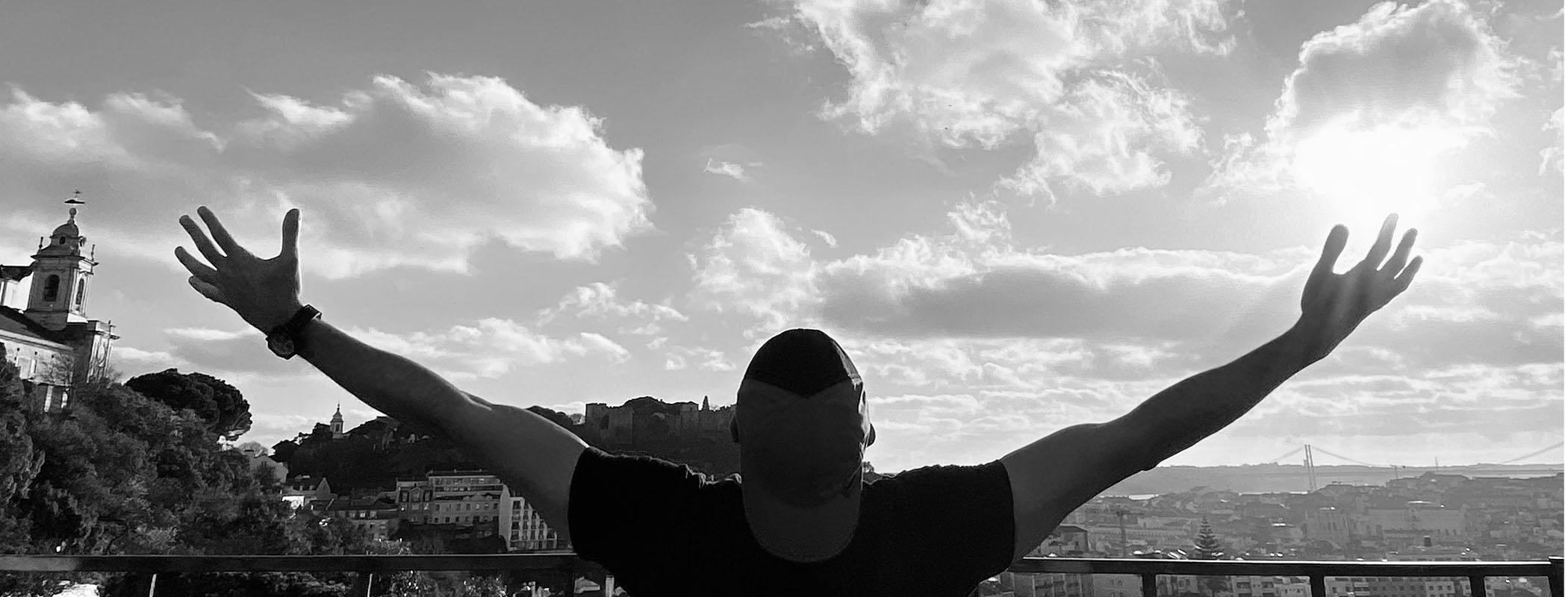 Ben Fahimnia with arms raised